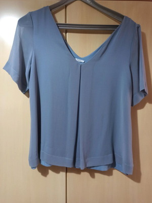Turquoise blouse like new, lightly worn, with transparent sleeves size M