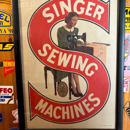 Singer vintage advertising poster used