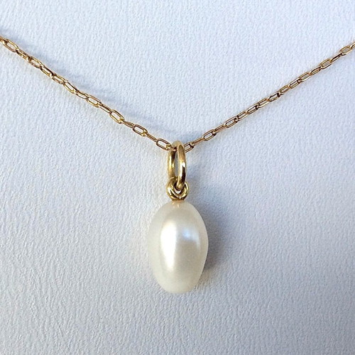 Oval Pearl Pendant like new with Gold-Plated Setting and Ring