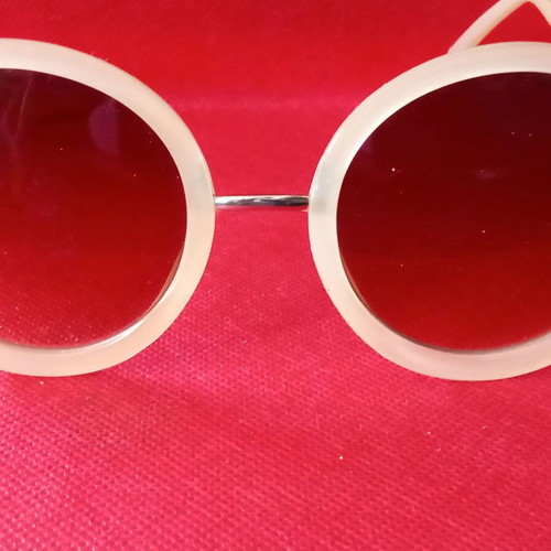 Sunglasses used, beige color