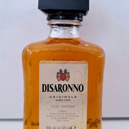 Disaronno collectible miniature sealed glass bottle