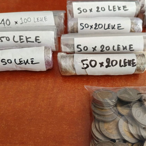 Albanian coins used, total 25,580 ALL in various denominations