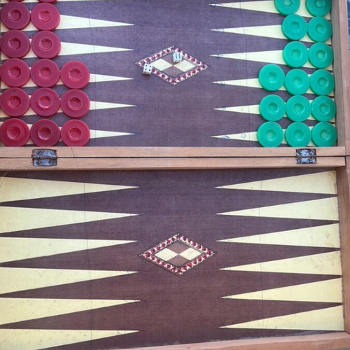 Wooden backgammon used with visible wear