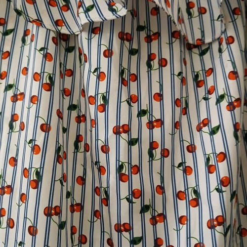 Sleeveless dress with ruffles like new, stripes and cherries print