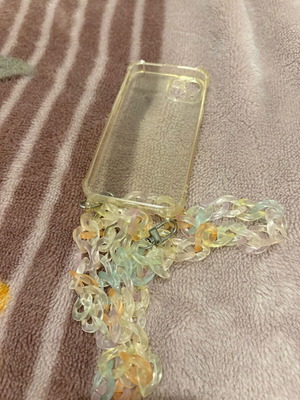 iPhone 13 case like new with plastic cord
