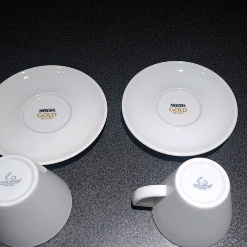 Nescafé Gold porcelain cup and saucer set new