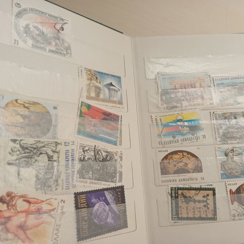 Stamp album with Greek stamps