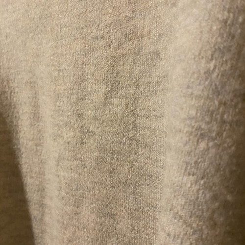 Beige pullover like new, large fits small and medium