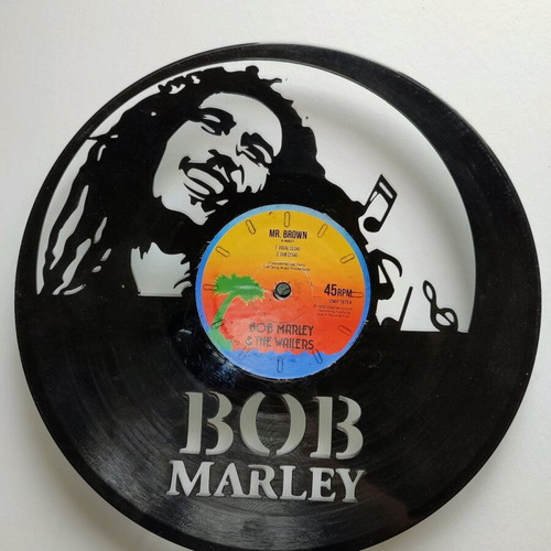 Vinyl record rolls with a design cut on it of Bob Marley
