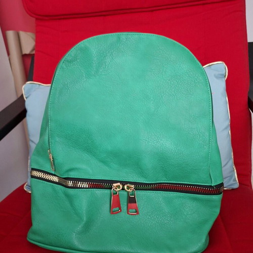 Green leather backpack new with spacious compartments
