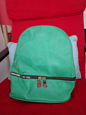 Green leather backpack new with spacious compartments