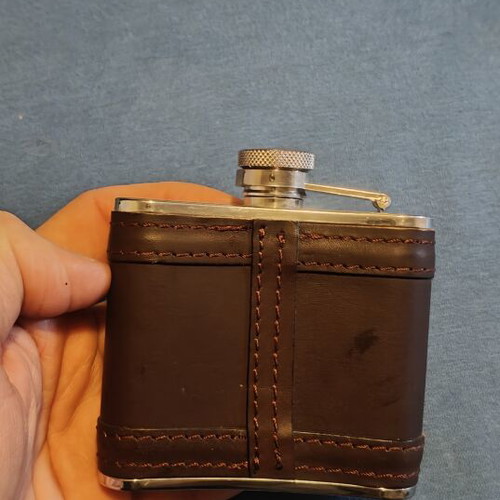 Flask 4oz stainless steel with leather cover like new
