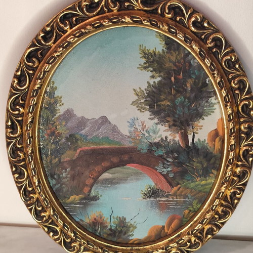 Oval vintage painting on canvas with golden frame used