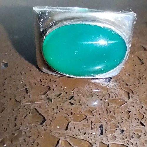 Sterling silver ring with green onyx cabochon used