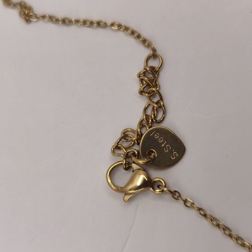 Gold-plated stainless steel necklace with green teardrop pendant