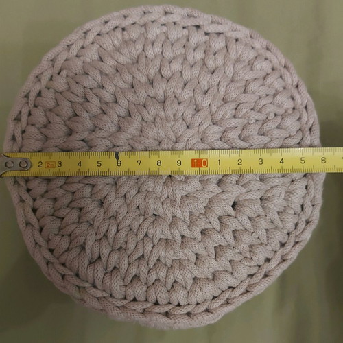 Knitted basket like new with gifts made of macrame cord
