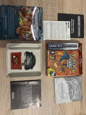 Pokemon Fire Red CIB με ανταπτορα σαν καινούργιο, δώρο κάρτα Charizard