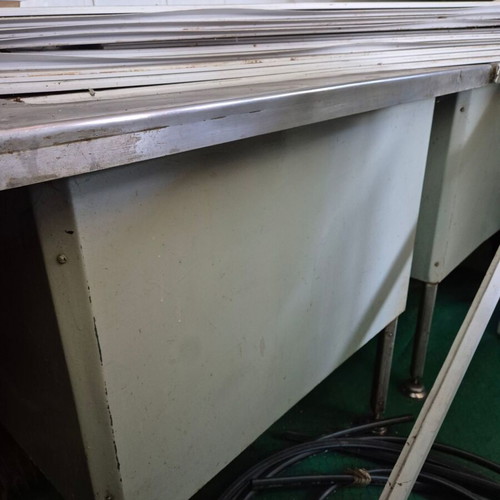 Stainless steel tables and sinks for restaurants used