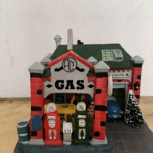 Decorative gas station like new with vehicles