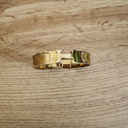 Hermès Clic H Enamel Bracelet like new, gold color