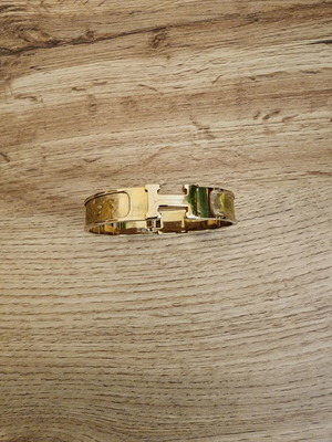 Hermès Clic H Enamel Bracelet like new, gold color