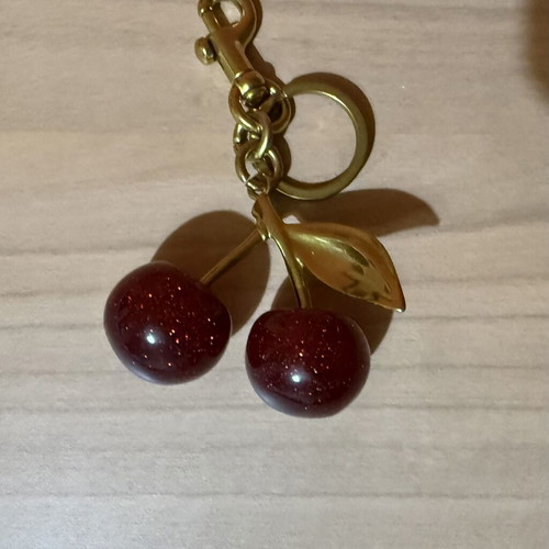 Cherry bag accessory or keychain new, red and gold