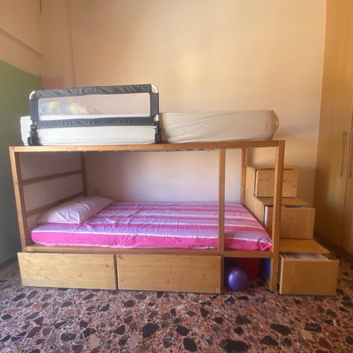 Kura bed used with convertible bunk and storage drawers