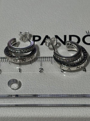 Pandora silver earrings like new with rare engraved logo and zircon stones
