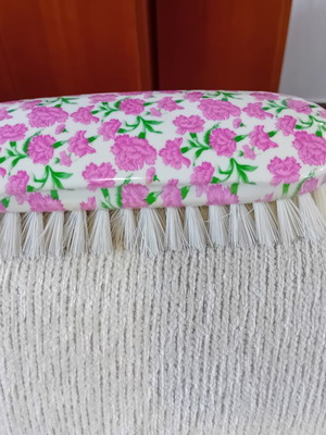 Clothing brush floral pattern like new