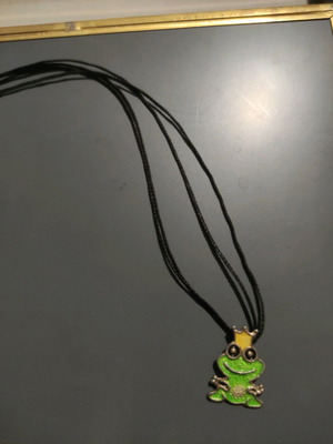 Necklace with double cord frog pendant