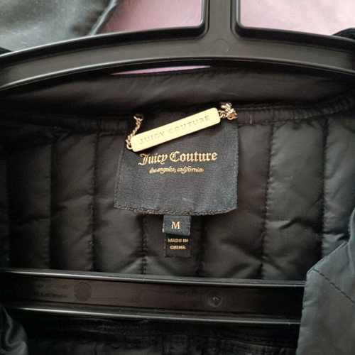Juicy Couture jacket with down lining size Medium like new, black and white