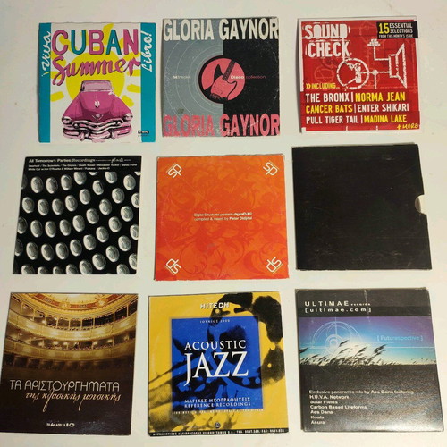 9 music CDs like new, pack with paper case and cover