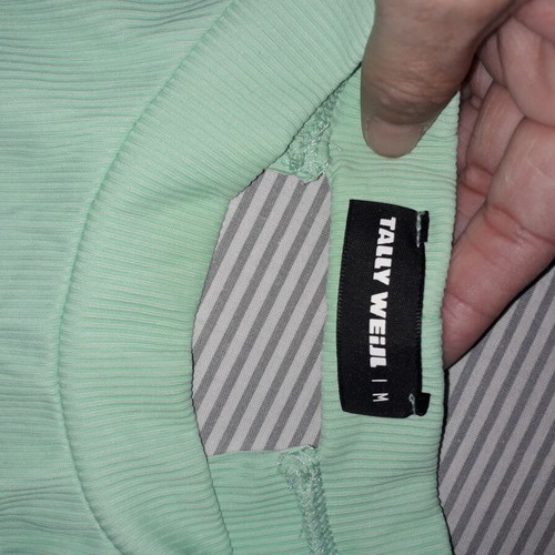 Top ribbed elastic with open back like new