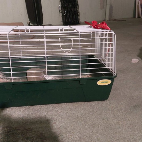 Rabbit cage used with waterer and feeder