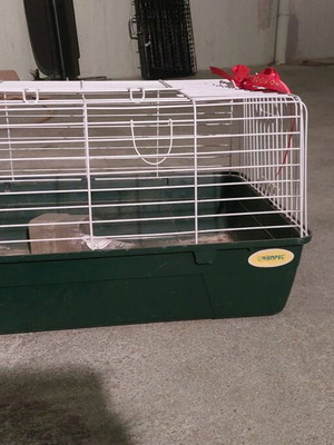 Rabbit cage used with waterer and feeder