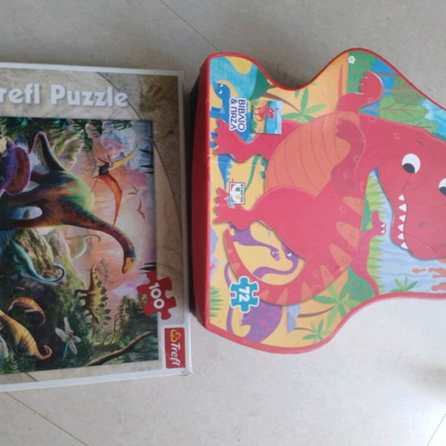 Dinosaur puzzles like new, 75 and 100 pieces