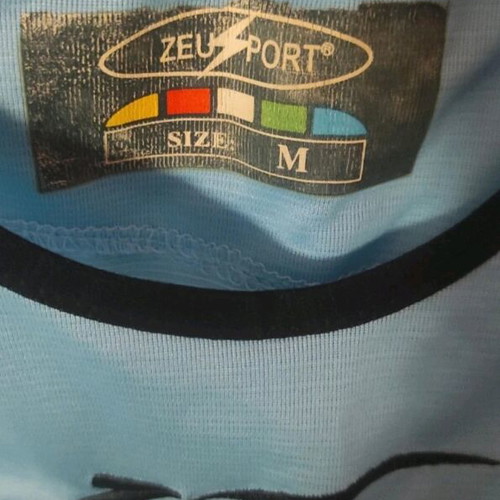 Zeus sportswear medium like new, white and turquoise