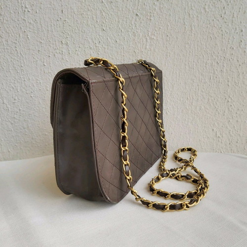 Dark brown crossbody bag like new with gold details