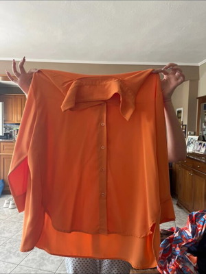 Women's orange shirt like new, size large - extra large