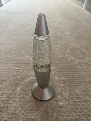 Relaxing decorative item with glitter and water like new