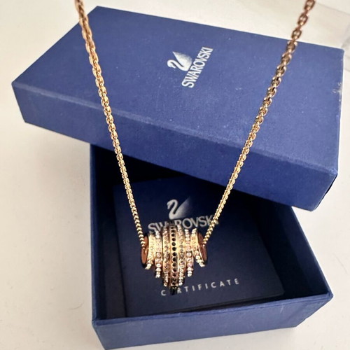Swarovski Further necklace like new, gold tone with black and clear crystals