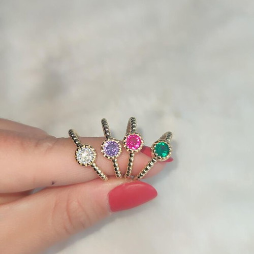 Adjustable ring new in green, pink, white, purple colors