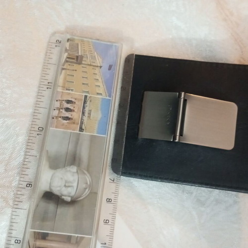DKNY pin with metal clip like new
