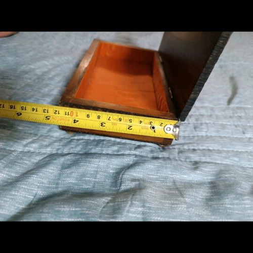 Vintage wooden box used with carved patterns