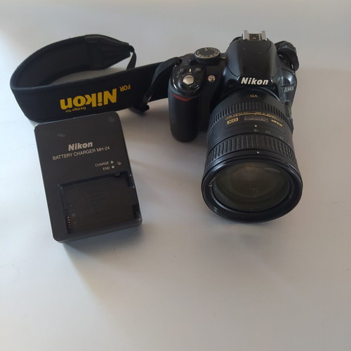 Nikon D3100 DSLR camera used with AF-S DX Nikkor 18-200mm f/3.5-5.6G ED VR lens