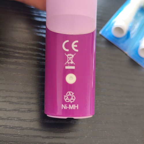 Oral-B electric toothbrush used with 6 replacement heads purple