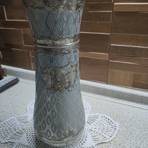Vintage decorative vase used with silver-plated body and blue enamel