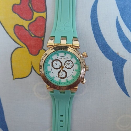 Mulco wristwatch turquoise and gold, used with minor wear