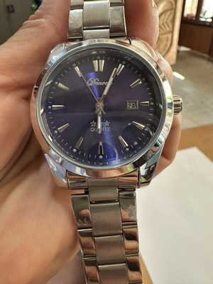 Donvoi Quartz men's watch new with blue dial and metal bracelet