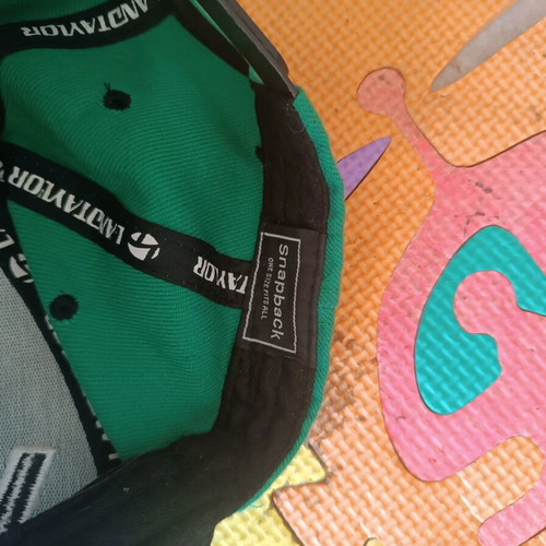 YOLO hat new, size L, black and green